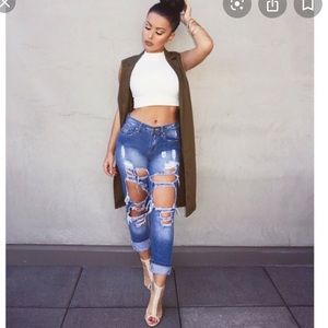 Reverse ripped jeans seen on Amrezy